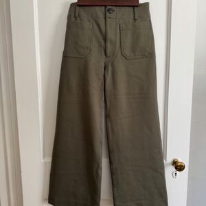 Anthropologie Maeve Colette pants in olive green.